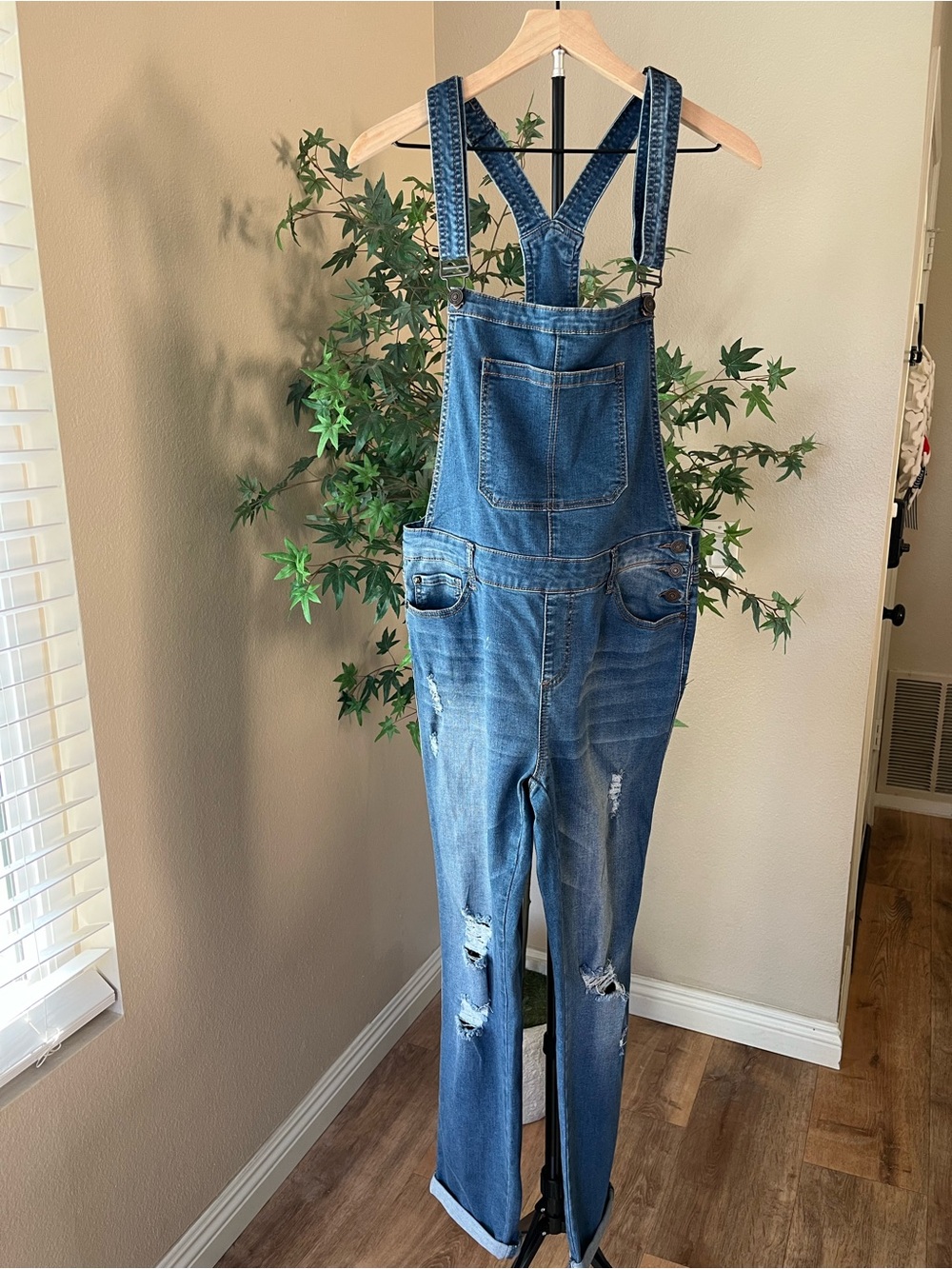 Washed Blue Denim Women’s Overalls with Distressed Detail